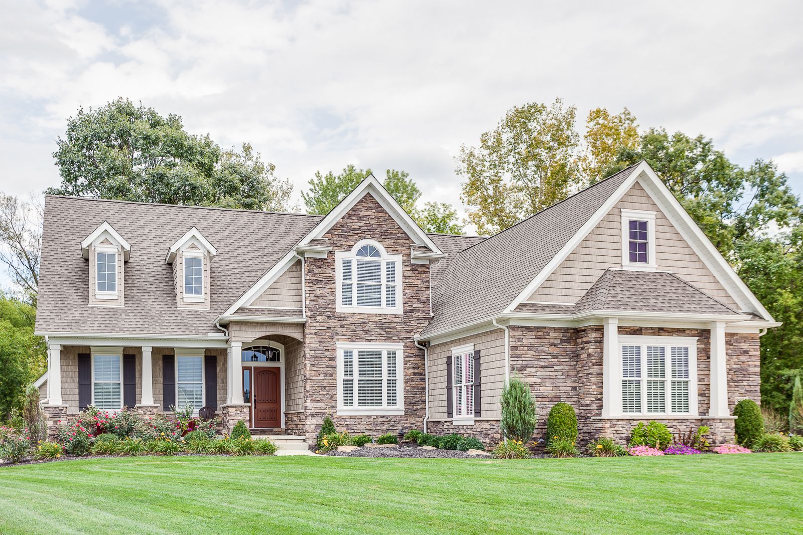 Exterior of VictoryGate built home. Brick and siding
